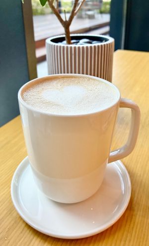 Oat milk latte at Alizeé Restaurant in Dubai