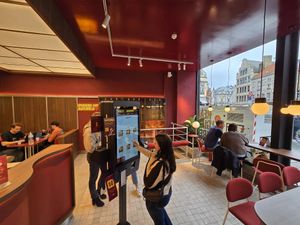 Interior, order at screens at Pureto - Brugge Eiermarkt in Bruges