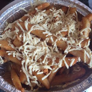 vegan cheese fries! (ask for an order of fries with daiya cheese!) at Uncle Oogie's Pizza in Sea Isle City