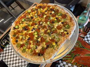 Amazing pizza! Got half red sauce, half sweet potato sauce, allll vegan😄 at Wowee Zowee Pizza in Tustin