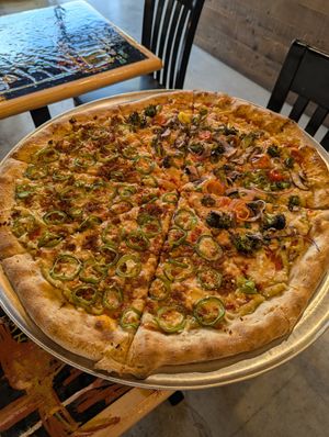 Half Natalie Portman (left) half vegan veggie (right) at Wowee Zowee Pizza in Tustin