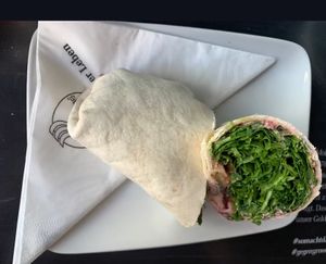 Wrap with rocket salad, red beet hummus, and sweet mustard - delicious, give it a try! (This is the small version, the larger one is 4 pieces).  at Blueorange Coffee and Bagel - Margaretenstrasse in Vienna