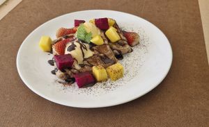 Waffle with natural banana sweetness,fresh fruits,icecream,just pure waffle bliss. at Bodhi Vegan Cafe & Restaurant in Phuket