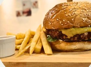 Cheezy burger. Just try this.it's next level delicious the plant based burger. at Bodhi Vegan Cafe & Restaurant in Phuket