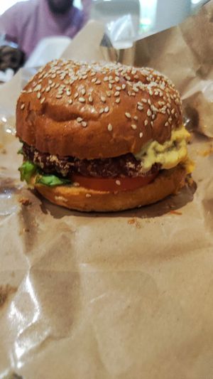 Cheezy Burger (delivered) at Bodhi Vegan Cafe & Restaurant in Phuket