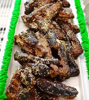 Korean Ribs - The experience begins with a tapioca and brown sugar dry rub destined to be cooked to crispy perfection, sealing in layers of sweet and savory sesame-infused flavor in a delicately braised morsel. Seoul food at its finest!
 at The Herbivorous Butcher in Minneapolis