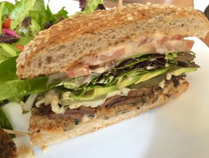 Veggie patty w/ tempeh bacon sandwich  at Powerplant Superfood Cafe in Los Angeles