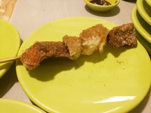 Fried mushrooms on a stick at Shuiwen in Taipei