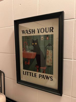 Bathroom has a delightful cat theme! at Casa da Mully in Lisbon