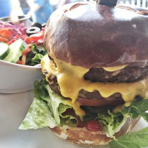 Double Noble Burger with cheese at Alice & Friends in Oak Park in Oak Park