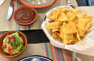 Chips and guacamole and salsa—definitely worth getting  at Sand Pebbles Lounge in Beijing