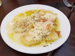 Potatoes with cheese sauce at Vegan Rock in Sevilla