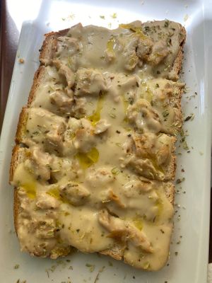 Tosta con queso vegano y no pollo at Vegan Rock in Sevilla