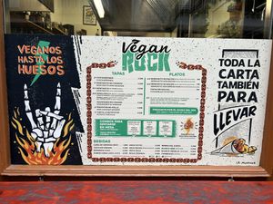 Menu on the window  at Vegan Rock in Sevilla