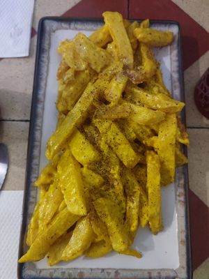 Patatas revueltas (increíble) at Vegan Rock in Sevilla