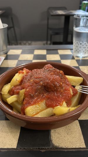 Potatoes with meatballs and tomato sauce  at Vegan Rock in Sevilla