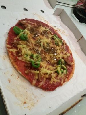 Sausage and peper pizza at Vegan Rock in Sevilla