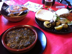Espinaca con garbanzo (spinach with chickpeas, sooo tasty!) and Burgers.  at Vegan Rock in Sevilla