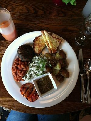 Sunday Summer Brunch: From the mains I chose the 'Chef's Big Brekky'- scrambled organic eggs or organic tofu, baked beans, potato hash browns, grilled tomatoes, vegan 'Black Pudding', patty with toast and chia jam....it was awesome!!! at Vidya's Veggie Gourmet in Thornton