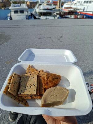 Vegan cheese and crackers at Sacred Garden Plant Based Deli in Rhodes