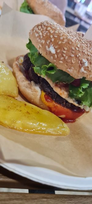 Visited today and had a burger, cheesecake, and homemade lemonade.  It was amazing! at Sacred Garden Plant Based Deli in Rhodes