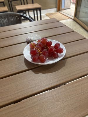 complementary grapes at Sacred Garden Plant Based Deli in Rhodes