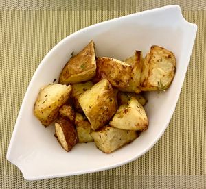 Herb roasted potatoes  at Eat & Meat in Dubai