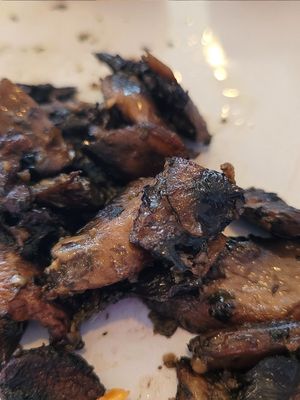 Side of roasted mushrooms, which had weird herbs on them at True North in Coburg