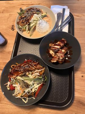Mock duck in peanut sauce, crispy tofu, and mock chicken with fried udon    at Da Nang Vegan in Essen
