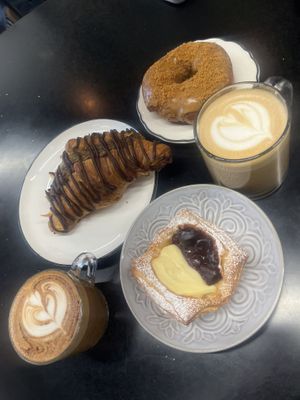 cherry danish, biscoff donut, dubai chocolate croissant (get a plain one instead)   at Canela Vegan Bakery & Cafe in Calgary