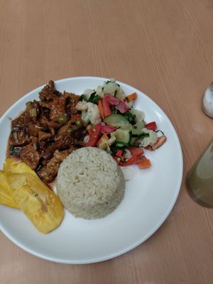 Gluten with mushrooms, veggies, rice, plantains at De Nobles in Bogota
