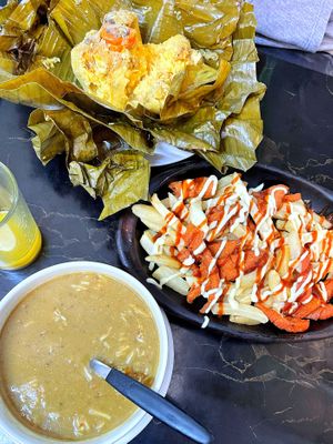 Tamal, salchipapas, and soup from the daily menu. All tasted better than it looks  at De Nobles in Bogota