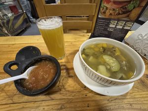 Lulo juice (sin azúcar), soup and chili sauce   at De Nobles in Bogota