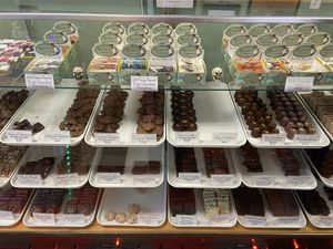 Vegan options are labeled with a V. Most dark chocolate options are vegan.  at Branson’s Chocolates in Ashland