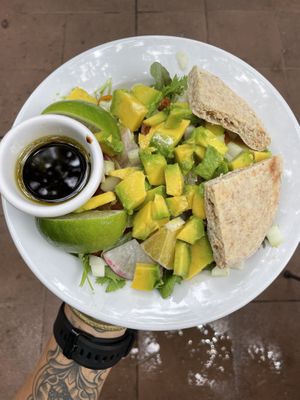 Olive and orange Greek green salad with avo in place of cheese at Juice Bar at the Harmony Hotel in Nosara
