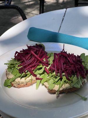 Pesto hummus and arugula sandwich at Juice Bar at the Harmony Hotel in Nosara
