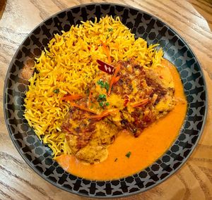 Creamy cashew veg with spicy rice  at Nando's Nshama - Town Square  in Dubai