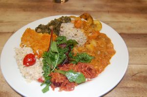 Calallo and Chickpeas, Wild Rice, Louisiana Veg Gumbo, 3 raw salads and fried Plantain at The Calabash of Culture in South East London