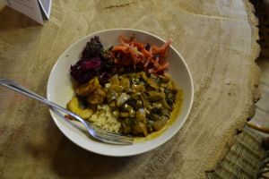 Mushroom stroganoff with cous cous, fried plantain and two raw salads. at The Calabash of Culture in South East London