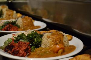 Louisiana Vegetable Gumbo for a party of 5! Served with brown basmati rice, a side of fried plantain and 3 raw salads. at The Calabash of Culture in South East London