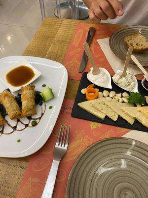 Cheese platter and spring rolls at Gintilla in Cagliari