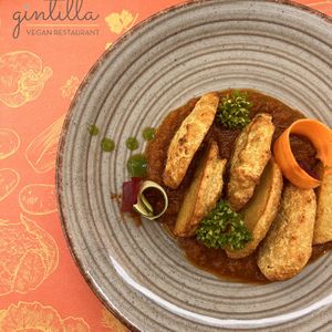 Chickpea and rice nuggets with ajika sauce. 😋   at Gintilla in Cagliari