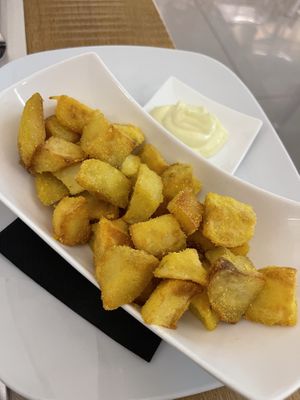 Potatoes with corn crust  at Gintilla in Cagliari
