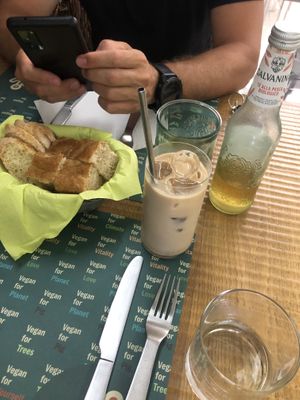 Iced decaf coffee with soymilk, peach ice tea, bread   at Gintilla in Cagliari