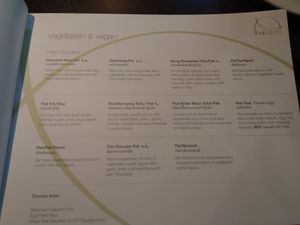 New menu displays which dishes aren't vegan in the vegetarian & vegan section and what animal products they contain at Thai Sakon in Huddersfield