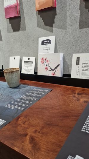 Tables, seat in front of the wall like a real ramen bar at Yume | La via Zen del Ramen in Padua