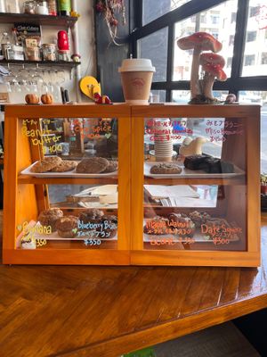 Baked goods on display. Green heart is vegan 💚 at Flying Mushroom Cafe in Tokyo