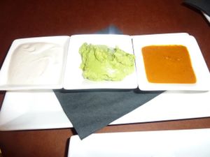 Sour cream, guacamole, salsa at Candle 79 in New York City