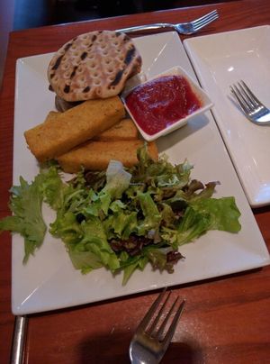 Burger with polenta fries at Candle 79 in New York City