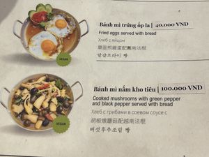 fried eggs described as vegan  at Nhà An - Vietnamese local food restaurant and vegan in Da Nang